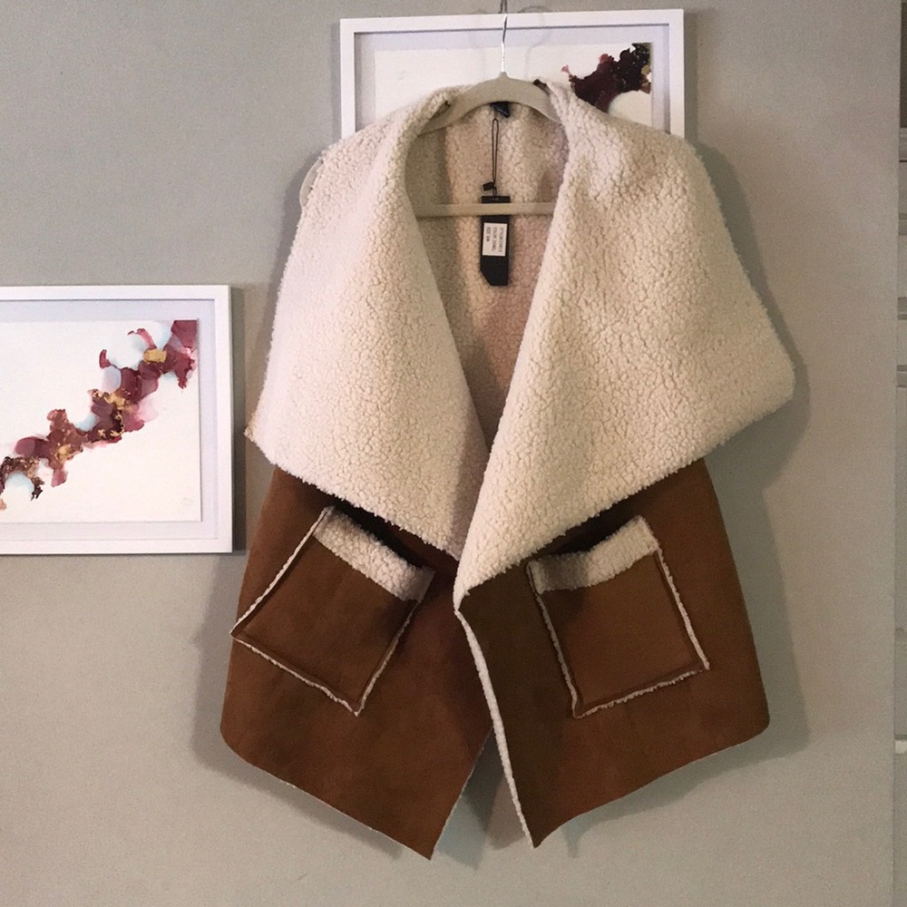 Mid length wool lined vest